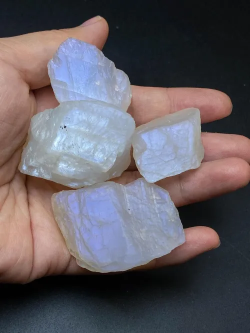 Authentic moonstone ring displaying blue adularescence under natural light