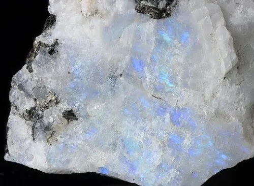 Close-up comparison showing different moonstone qualities