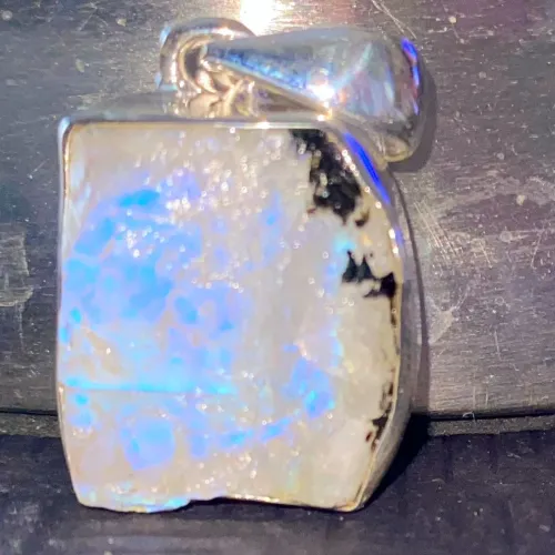 Comparing high and low quality moonstone under natural light