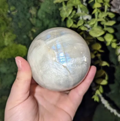 Comparing real and imitation moonstones under light