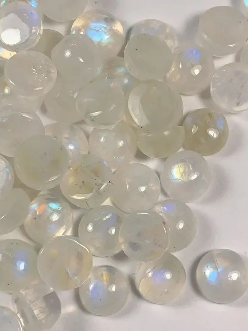Comparing real vs fake moonstone under magnification