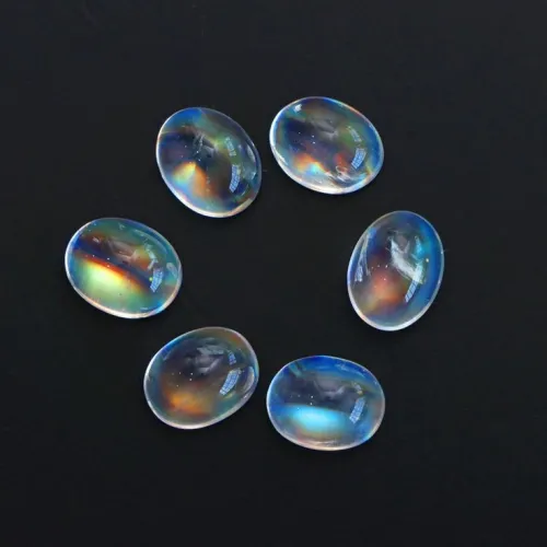 Comparison of moonstone flashes: blue vs. peach vs. multi-color adularescence