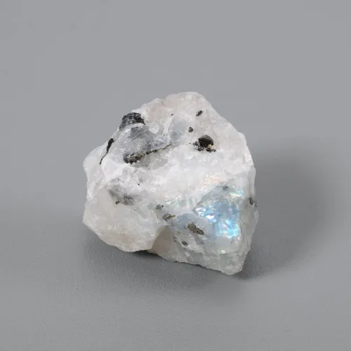 Microscopic view of moonstone layers creating light refraction