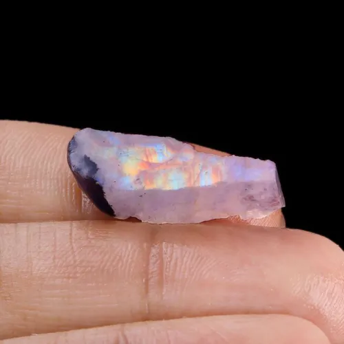 Raw moonstone embedded in host rock